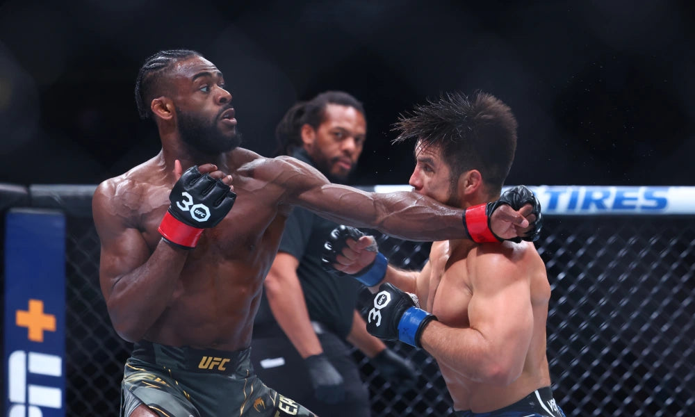 Henry Cejudo's Coach Claims UFC 288 Drew 700K Buys Amidst Skepticism from Aljamain Sterling