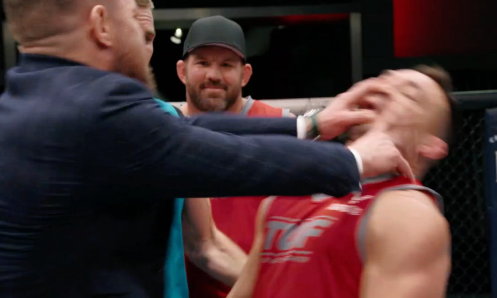 Watch Conor McGregor's Forceful Two-Hand Shove on Michael Chandler During 'TUF 31'